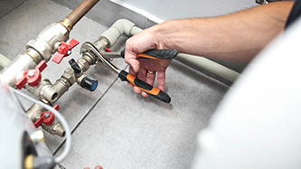 electrician checking Heat Pumps, Heating Service, and Home Heating in North Hills, NC