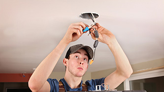 Electrician Performing an Electrical Repair at a Home in Rolesville, NC