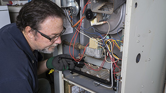 electrician providing Furnace Installation, Repair, and Replacement in North Raleigh, NC 