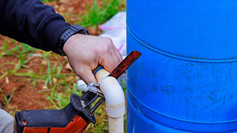 cutting pvc pipes during Well Pump Repair & Well Pump Replacement in North Raleigh, NC