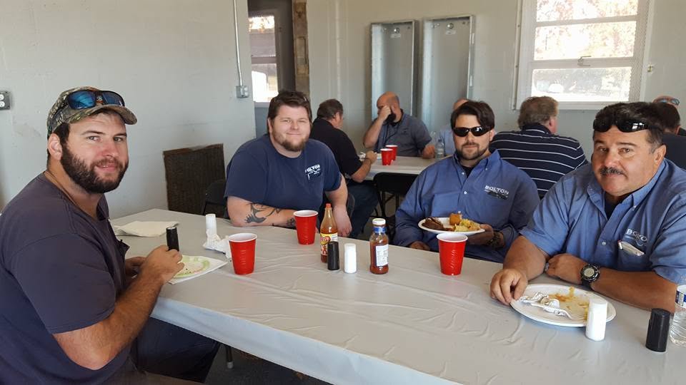 Employees of Bolton, a plumbing company, enjoying a company lunch in Raleigh, NC